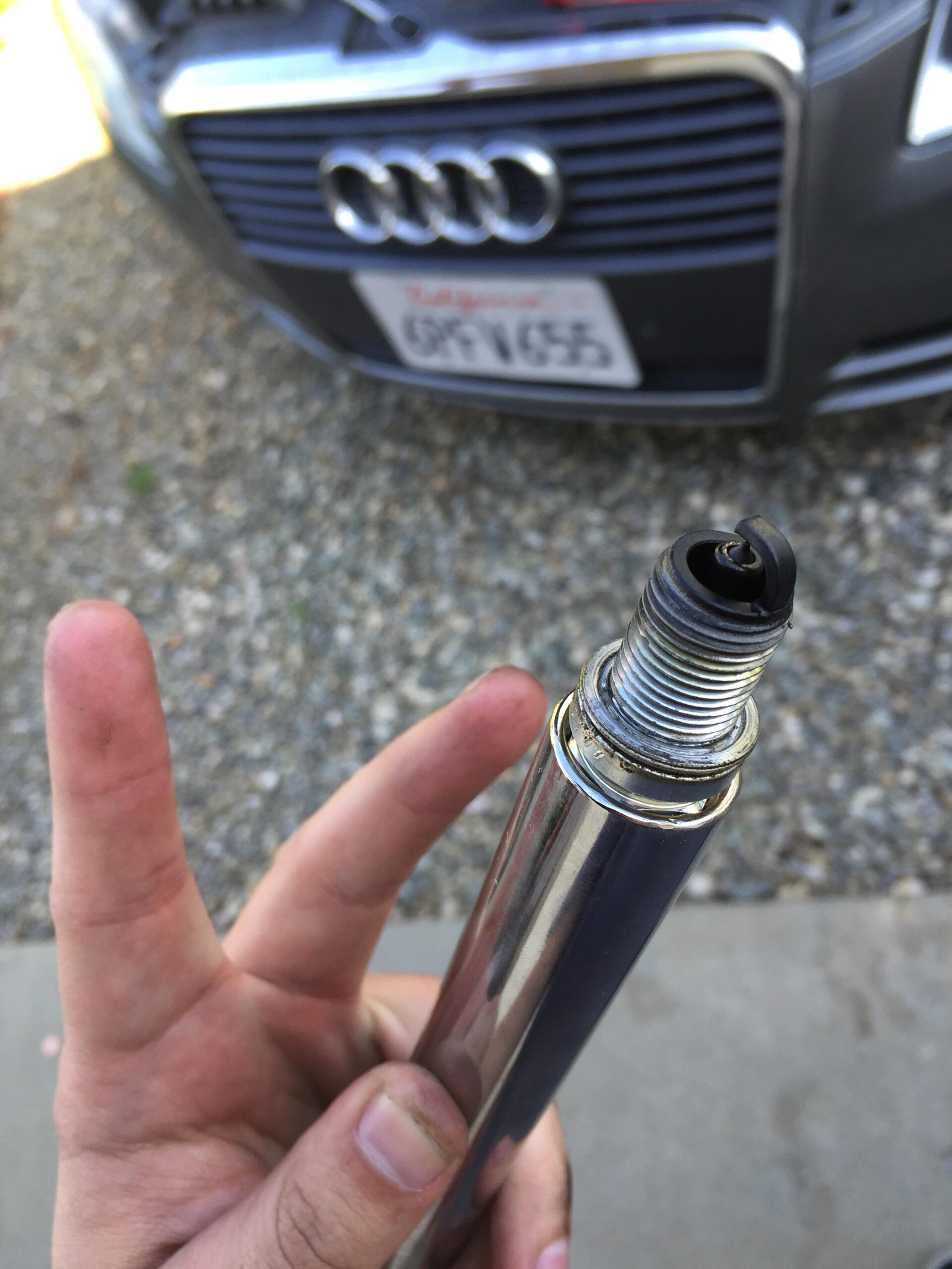 [SOLVED] Why Does My Spark Plug Smells Like Gas? WHY??